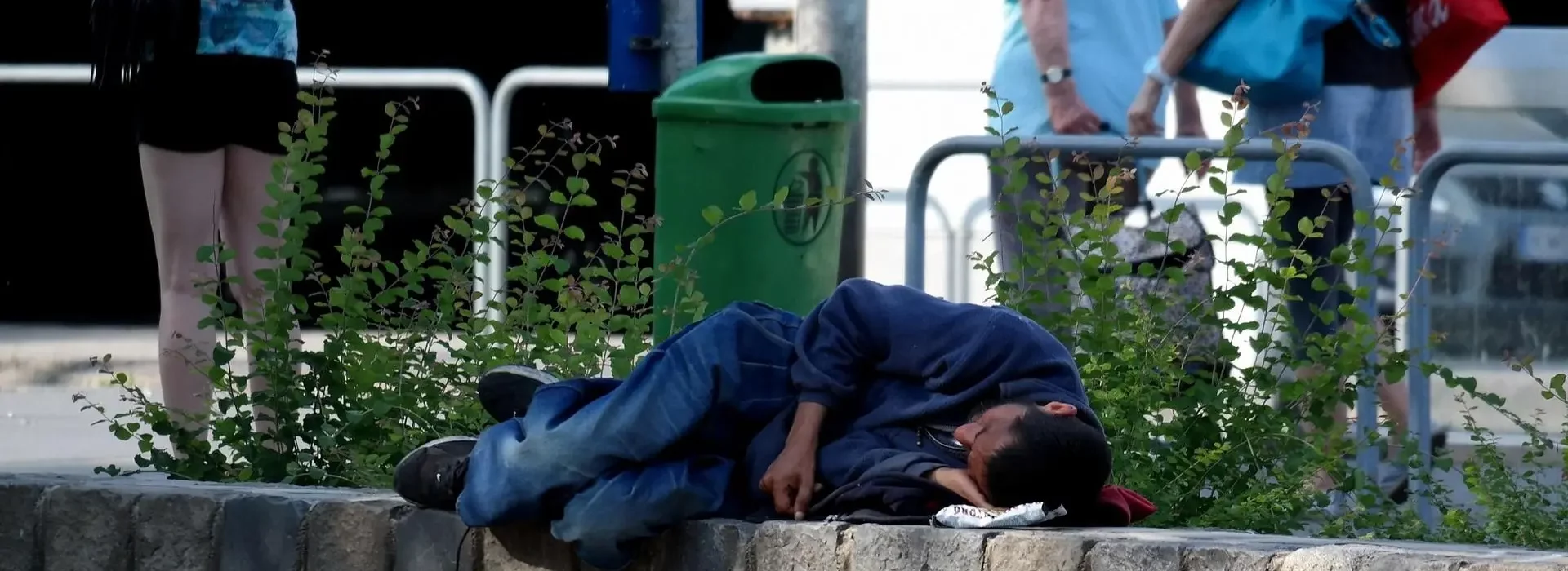 man sleep on wall